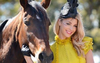 Attractive Woman Posing with Saratoga Race Track Horse